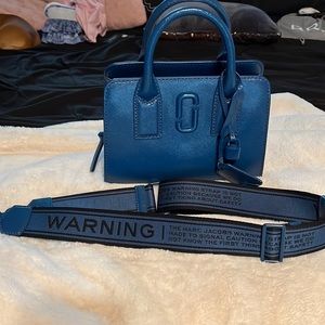Guitar strap that goes with purse